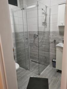 Koupelna v ubytování MIMA apartmani