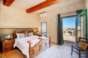 Postel nebo postele na pokoji v ubytování Ta Kalang Holiday Home + 20 fotografií