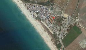 an aerial view of a castle next to the water at Zahara pueblo con parking y piscina in Zahara de los Atunes