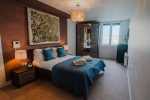 Letto o letti in una camera di Marina with a view / 2 bd flat