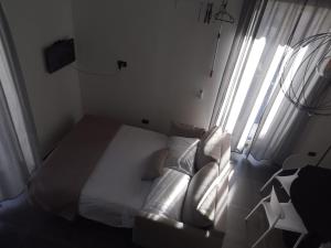 Ένα ή περισσότερα κρεβάτια σε δωμάτιο στο B&B SanDé