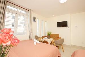 TV a/nebo společenská místnost v ubytování Vietnam Hotel Dalat