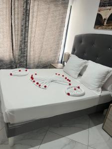 Postel nebo postele na pokoji v ubytování Residencial Santo Amaro