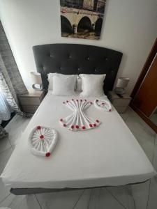 Postel nebo postele na pokoji v ubytování Residencial Santo Amaro