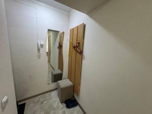 Ένα μπάνιο στο Светлые и уютные апартаменты с выходом в центральный парк