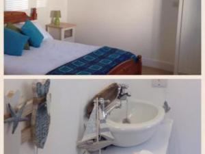 twee foto's van een slaapkamer met een bed en een wastafel bij Apple Tree Apartment in Pembroke