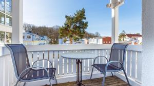 Balkón nebo terasa v ubytování Villa Freia App 16 - b nur 20m zum Strand in Binz b + 7 fotografií