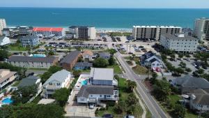 an aerial view of a city with the ocean at Beach Breeze 1, short walk to Atlantic Ocean, pet friendly, very quiet & family friendly in Myrtle Beach