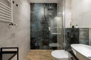 Phòng tắm tại A70 Laguna Beskidów Wellness&Spa Żeglarski +25 ảnh