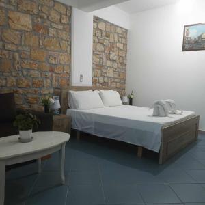 Postel nebo postele na pokoji v ubytování Sunset Guest house