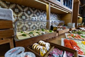 a buffet with many different types of food on display at Boutique Penzion Slovakia & Slovakia Residence in Košice