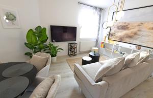 TV a/nebo společenská místnost v ubytování Studiový apartmán Tulum