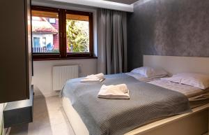 Ένα ή περισσότερα κρεβάτια σε δωμάτιο στο Rent like home - Droga na Bystre 4