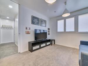 a living room with a tv and a couch at Apartment Sua Loft by Clabao in Pamplona