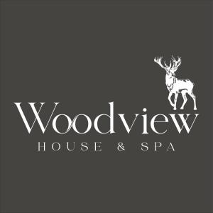 a logo for a house and spa with a deer at Woodview House in Elgin