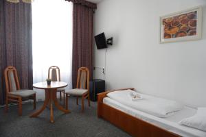 Postel nebo postele na pokoji v ubytování Hotel Pension Lumes - Self Check In