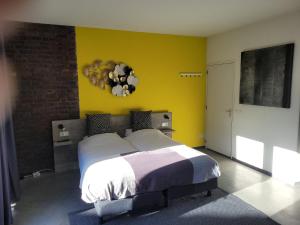 Posteľ alebo postele v izbe v ubytovaní Het Wit Huys