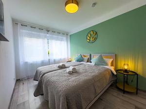 En eller flere senge i et værelse på ImmoStay #5 - City Ferienwohnung - WLAN & Netflix - Zentrum Bremen