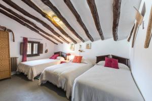 Postel nebo postele na pokoji v ubytování Casa Rural Atalaya-Coy