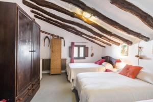 Postel nebo postele na pokoji v ubytování Casa Rural Atalaya-Coy