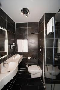 Koupelna v ubytování K Hotel