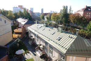 an overhead view of a building with a roof at Charming city studio in Tampere