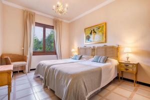 Ένα ή περισσότερα κρεβάτια σε δωμάτιο στο Villa Andres +28 φωτογραφίες