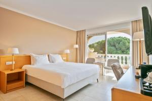 Postel nebo postele na pokoji v ubytování Van der Valk Hotel Barcarola + 34 fotografií