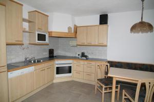 Kuchyň nebo kuchyňský kout v ubytování Apartment Erhart