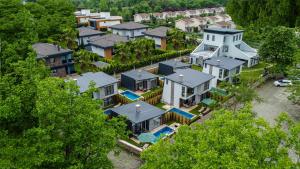 an aerial view of a large group of houses at Vital Home Sapanca Isıtmalı Havuzlu Villa&Bungalov in Sapanca