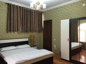 Ένα ή περισσότερα κρεβάτια σε δωμάτιο στο Hello Dushanbe Hostel