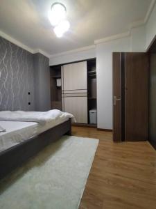 Postel nebo postele na pokoji v ubytování 2 Bedroom in Kilimani Ngong Rd