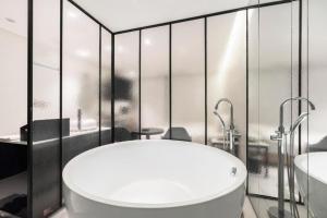 Koupelna v ubytování Cacao Hotel