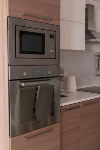 Dapur atau dapur kecil di Upper Valley Mansions, No.25