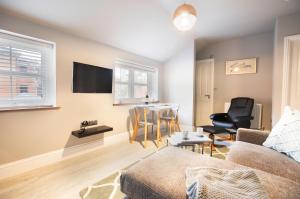 Μια τηλεόραση ή/και κέντρο ψυχαγωγίας στο Bay Tree Apartments