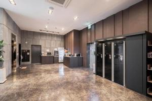 Kuchyň nebo kuchyňský kout v ubytování Cacao Hotel