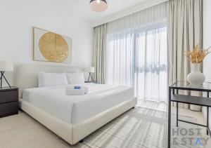 Voodi või voodid majutusasutuse Ramadan Luxury- Stay Your Way at Downtown Dubai toas