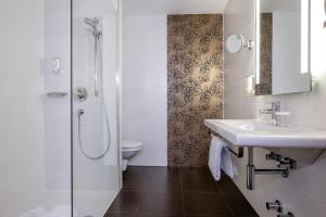 Phòng tắm tại Hotel IMLAUER Wien
