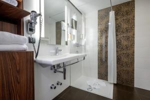 Phòng tắm tại Hotel IMLAUER Wien