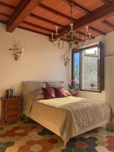 Кровать или кровати в номере House with a view in Tuscany