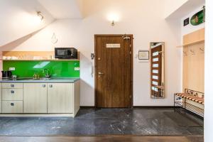 Kuchyňa alebo kuchynka v ubytovaní Rent like home - Strzelców 30C
