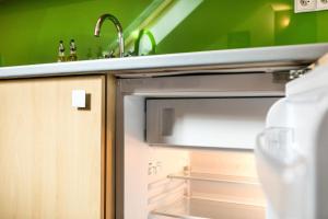 Kuchyňa alebo kuchynka v ubytovaní Rent like home - Strzelców 30C