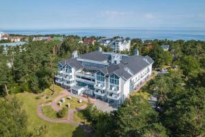 an aerial view of a large house with a large building at BSW Hotel Ahlbeck in Ahlbeck