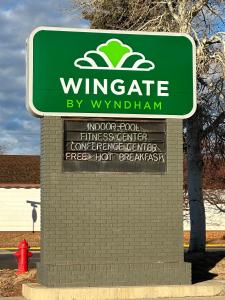 a sign for a wyncote by wyncote firm at Wingate by Wyndham Gunnison Near Western Colorado University in Gunnison