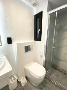 Koupelna v ubytování Citizen Suites