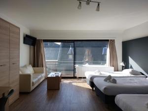 Postel nebo postele na pokoji v ubytování Value Stay Residence Mechelen - Studio Triple