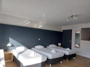 Postel nebo postele na pokoji v ubytování Value Stay Residence Mechelen - Studio Triple + 2 fotografie