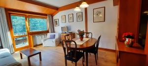 Posedenie v ubytovaní Appartamento di Montagna - Residence 'La Ginestra'