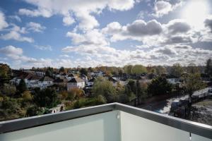a view of a city from a balcony at Fabulous & New - Private Balcony - Station Nearby in Orpington