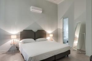 Posteľ alebo postele v izbe v ubytovaní Apartments Florence-Ginori Terrace